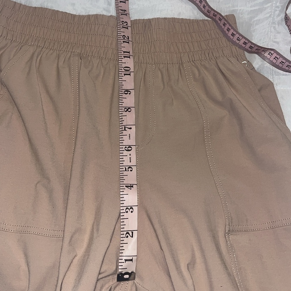 Calia by Carrie Underwood Nyluxe Joggers Pale Pink Size Small Zip Ankle - Picture 12 of 15